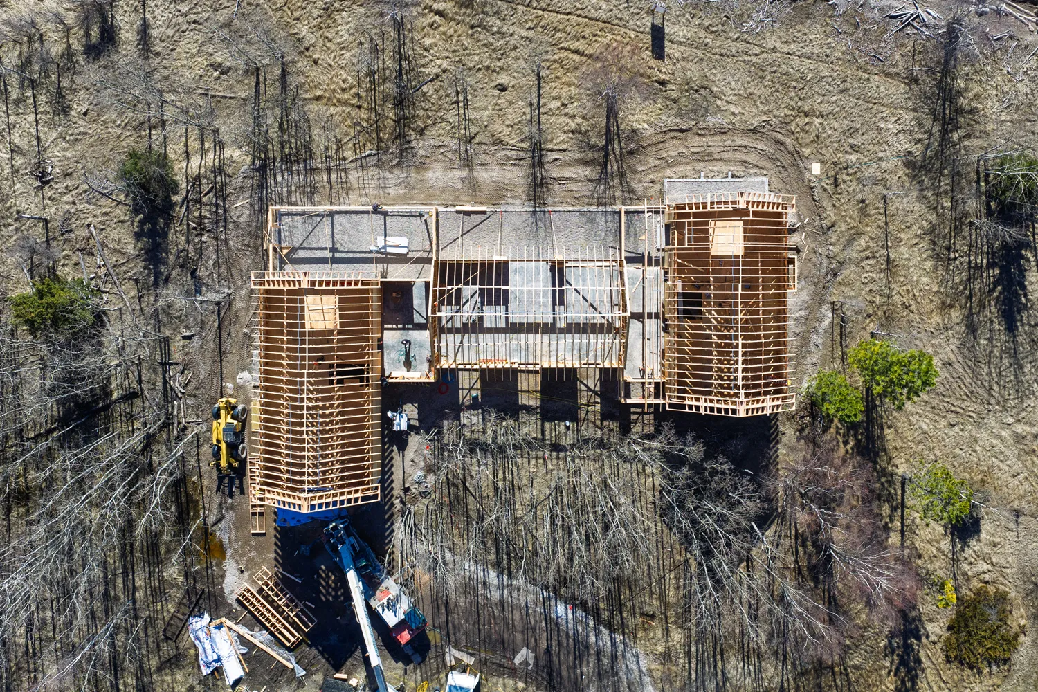 Aerial view of luxury custom home construction on Flathead Lake Montana