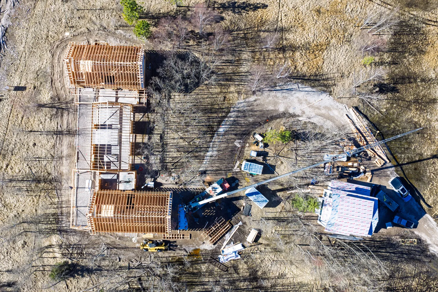 Aerial view of luxury custom home construction on Flathead Lake Montana